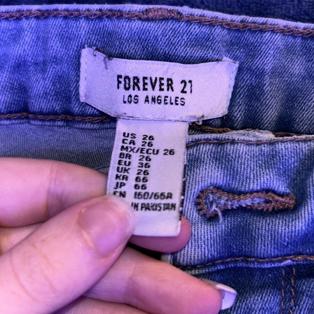 very holy light blue ripped jeans!